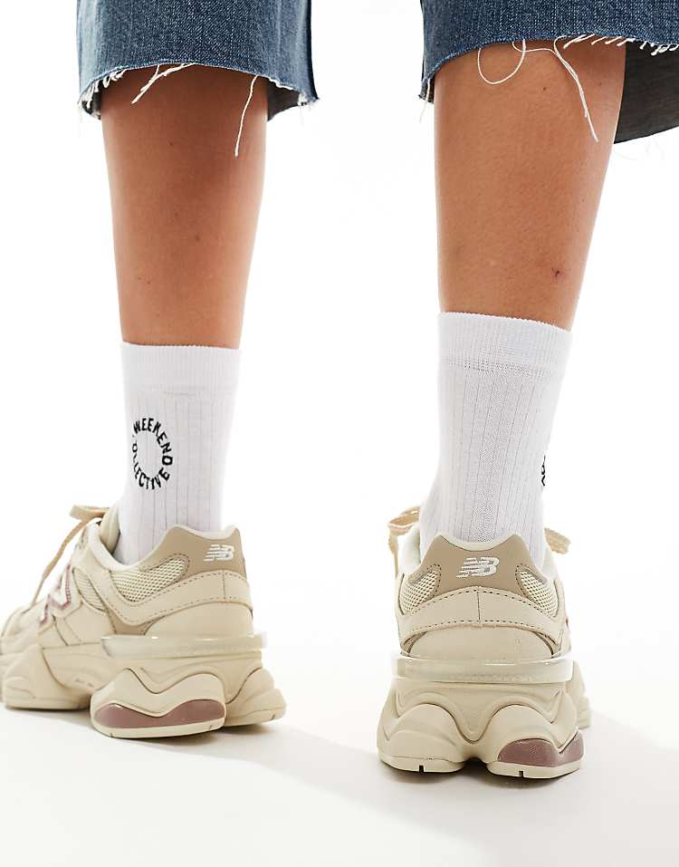 New Balance 9060 sneakers in white with gray metallic detail
