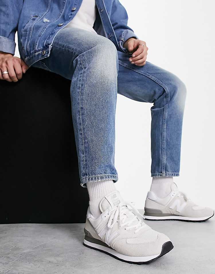New Balance 574 sneakers in gray and white