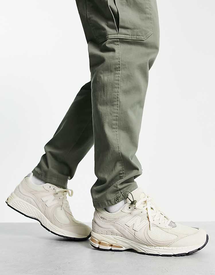 New Balance 2002 sneakers in green multi