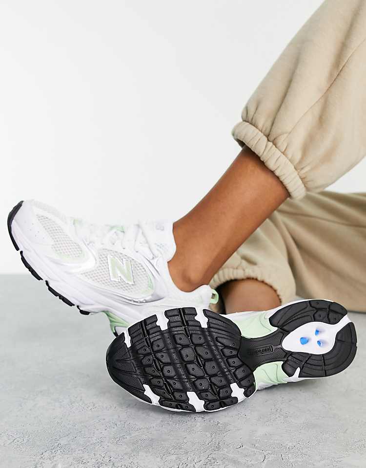 New Balance 530 sneakers in white and pastel green - exclusive to ASOS