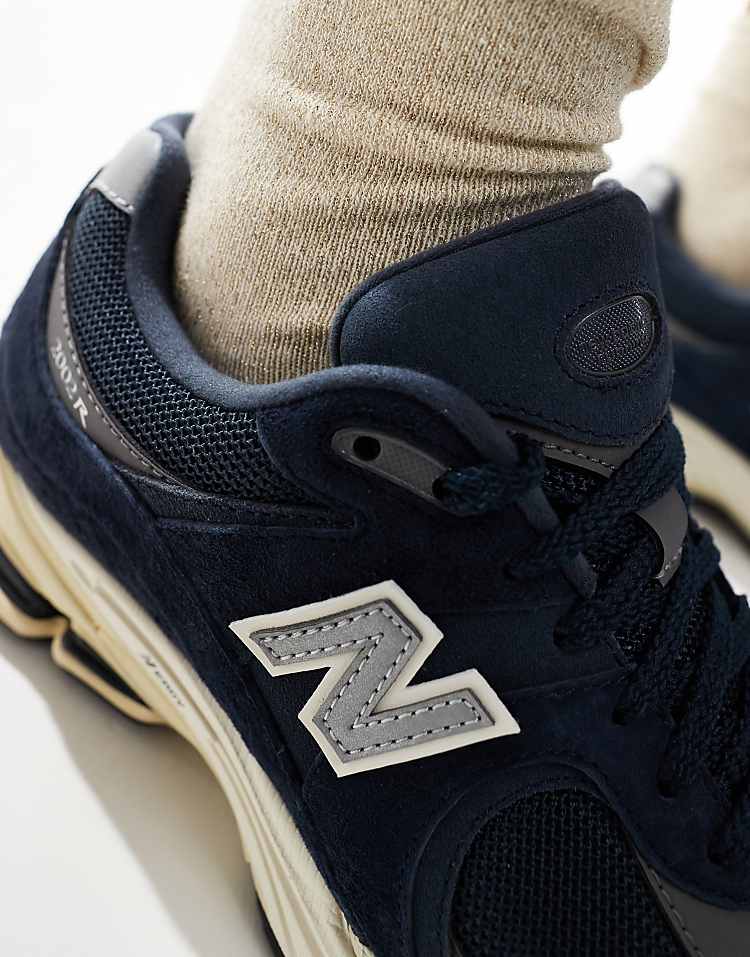 New Balance 2002 sneakers in green multi