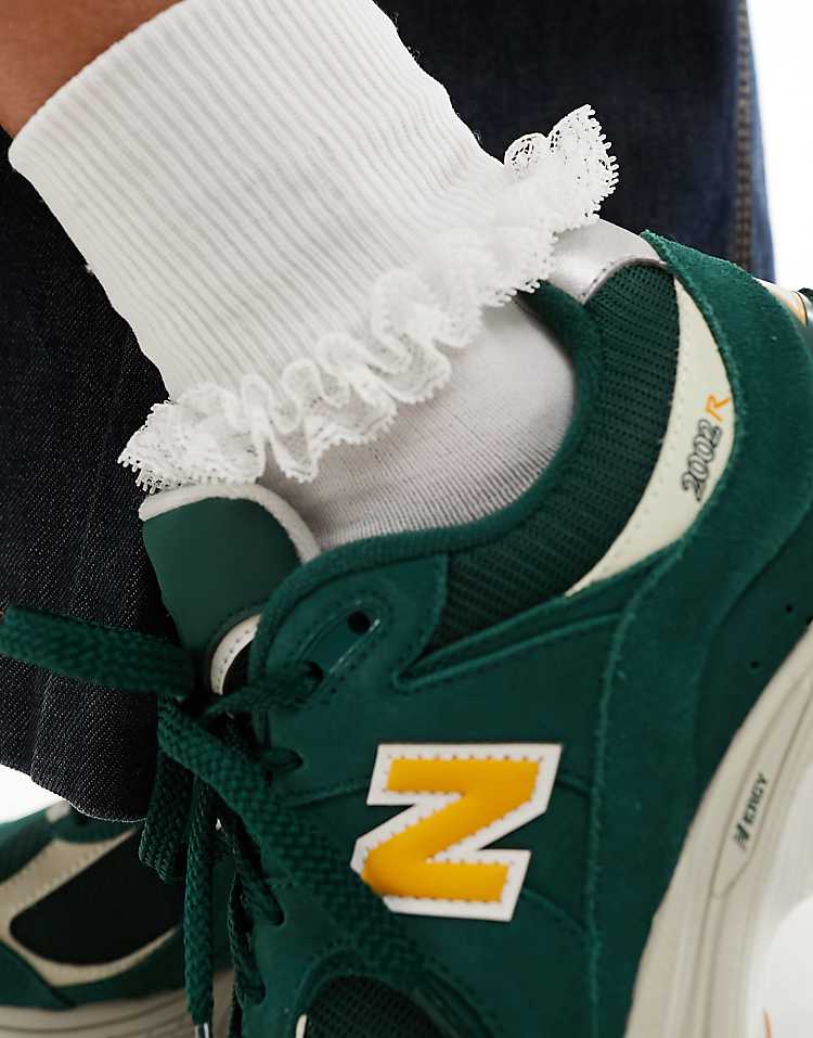 New Balance 2002 sneakers in green multi