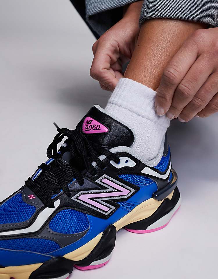 New Balance 9060 sneakers in white with gray metallic detail