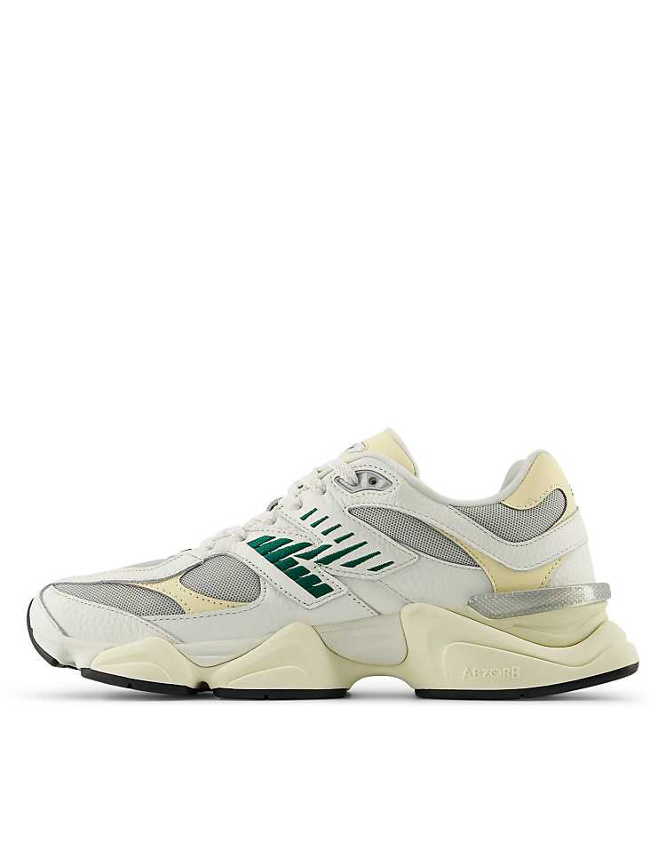 New Balance 9060 sneakers in white with gray metallic detail