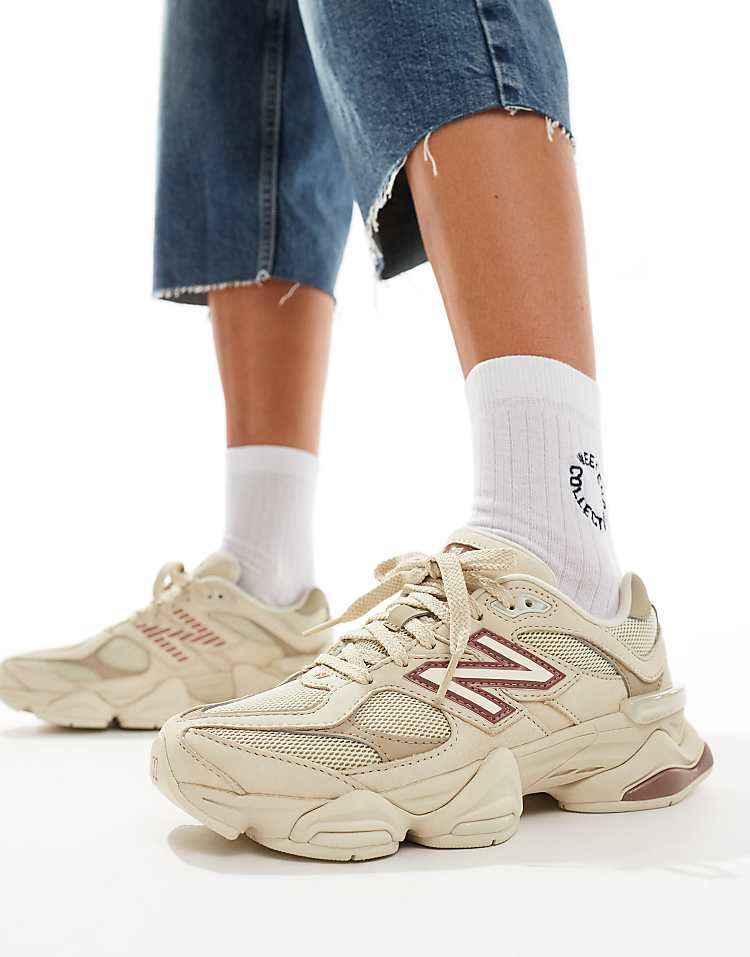 New Balance 9060 sneakers in white with gray metallic detail