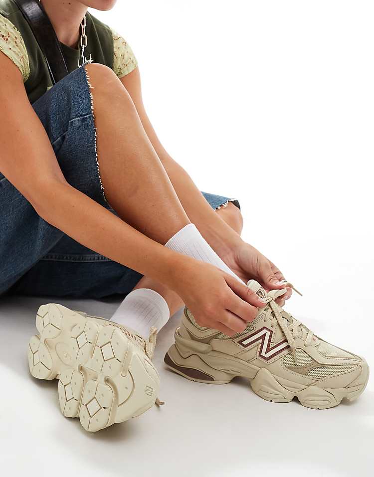 New Balance 9060 sneakers in white with gray metallic detail
